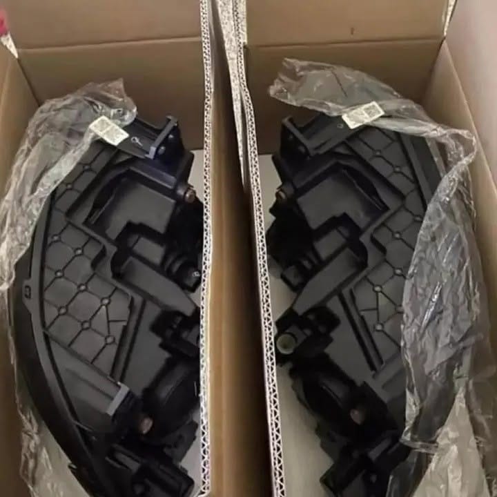 OEM headlights removed from a Dodge Charger - Image 3